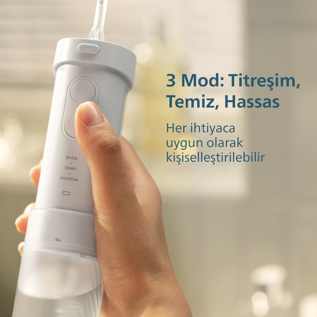 philips-hx3333-24-cordless-portable-flosser-blue-2-buttons-battery-powered-oral- image 4